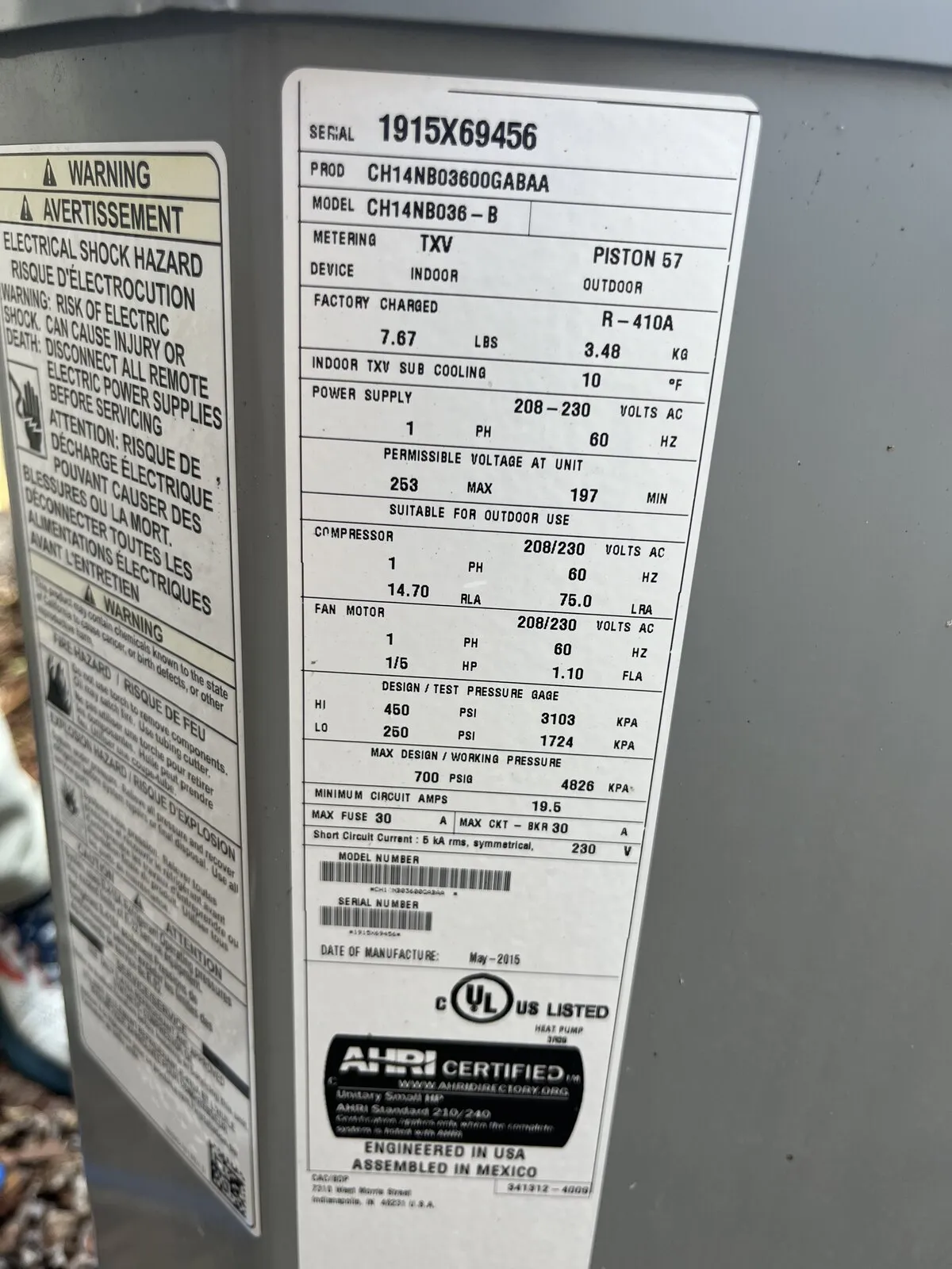 Outdoor unit data plate listing refrigerant type and factory charge, Lutz Lake Fern Rd, Lutz FL 33558