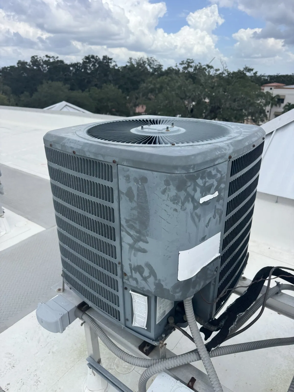 Rooftop condenser set on its stand after installation, Safety Harbor FL