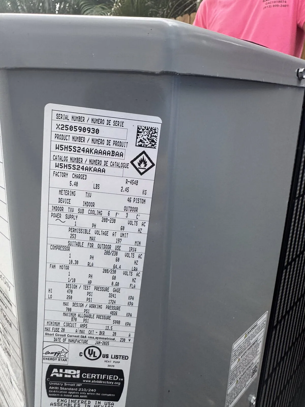 Outdoor unit data plate with model, serial and charge data, St. Petersburg FL