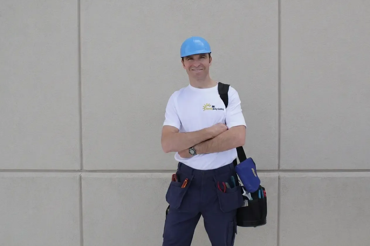 Sunny City Cooling technician outdoors with tool bag