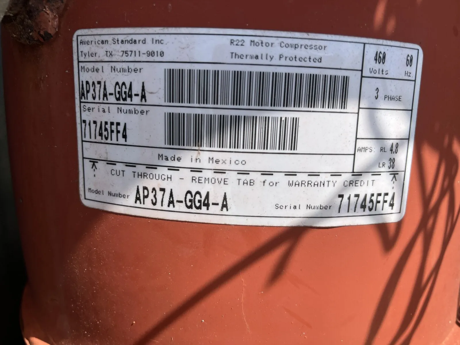 R-22 compressor label on an older air conditioning system, Wesley Chapel Blvd, Wesley Chapel FL 33544